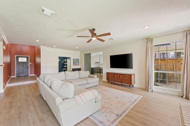 1017 Oak Knoll Ct, Sugar Land, TX 77498 - living area featuring a ceiling fan, light wood-style floors, baseboards, and recessed lighting
