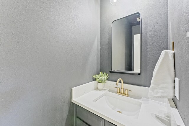 1017 Oak Knoll Ct, Sugar Land, TX 77498 - bathroom with vanity and a textured wall