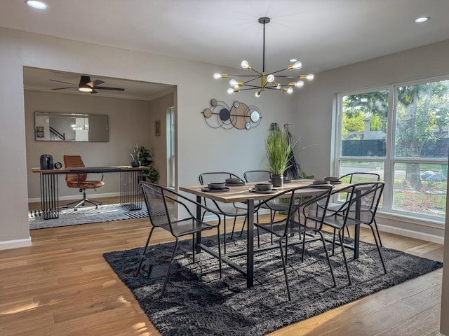 2106 Teague Rd, Houston, TX 77080 - dining space featuring healthy amount of natural light, baseboards, wood finished floors, recessed lighting, and ornamental molding