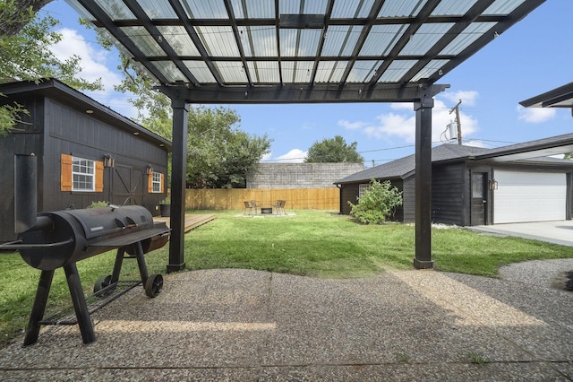 2106 Teague Rd, Houston, TX 77080 - view of yard with an outbuilding, a garage, and a pergola
