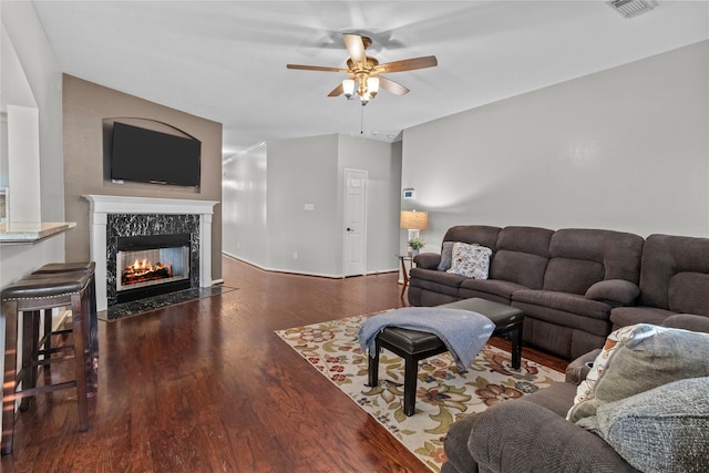3238 Bodine Dr, Pearland, TX 77584 - living room with ceiling fan, wood finished floors, a premium fireplace, and baseboards