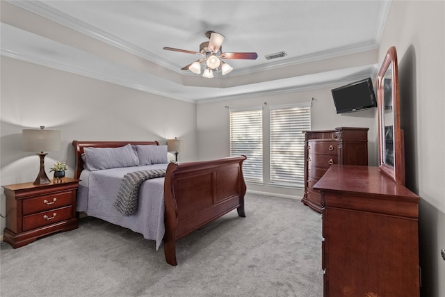 3238 Bodine Dr, Pearland, TX 77584 - carpeted bedroom featuring ornamental molding, a ceiling fan, and a tray ceiling