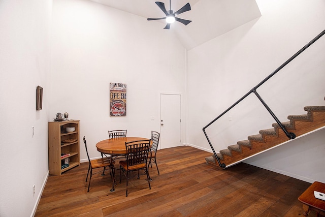 2778 Fm 2610th Rd, Cleveland, TX 77327 - dining space featuring stairway, ceiling fan, wood finished floors, high vaulted ceiling, and baseboards