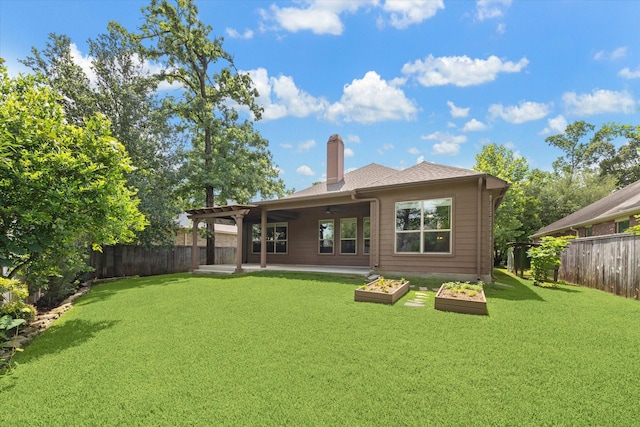 107 N Greenprint Cir, Tomball, TX 77375 - back of property with a chimney and a patio