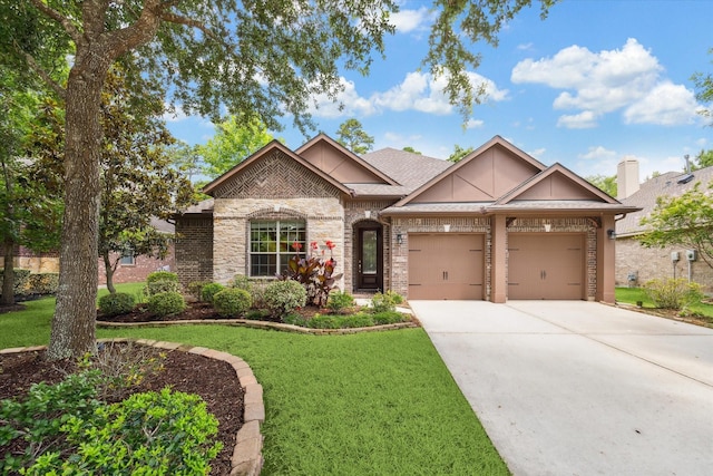 107 N Greenprint Cir, Tomball, TX 77375 - view of front of property featuring an attached garage, a front yard, concrete driveway, and brick siding