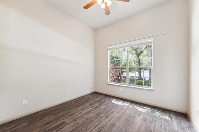 107 N Greenprint Cir, Tomball, TX 77375 - spare room with wood finished floors, a ceiling fan, and baseboards