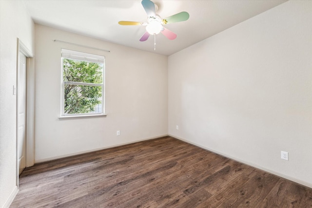 107 N Greenprint Cir, Tomball, TX 77375 - empty room with wood finished floors, ceiling fan, and baseboards