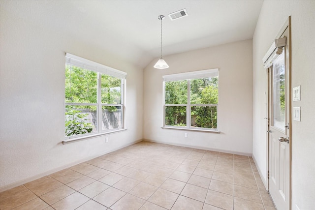 107 N Greenprint Cir, Tomball, TX 77375 - unfurnished room with light tile patterned floors, lofted ceiling, and baseboards