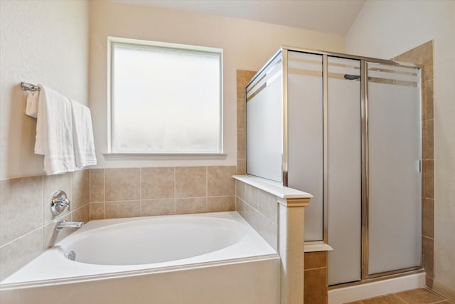107 N Greenprint Cir, Tomball, TX 77375 - bathroom with healthy amount of natural light, a shower stall, and a bath