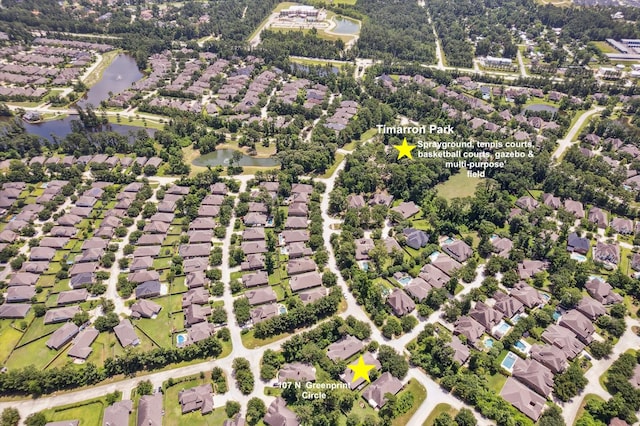 107 N Greenprint Cir, Tomball, TX 77375 - aerial perspective of suburban area featuring a large body of water