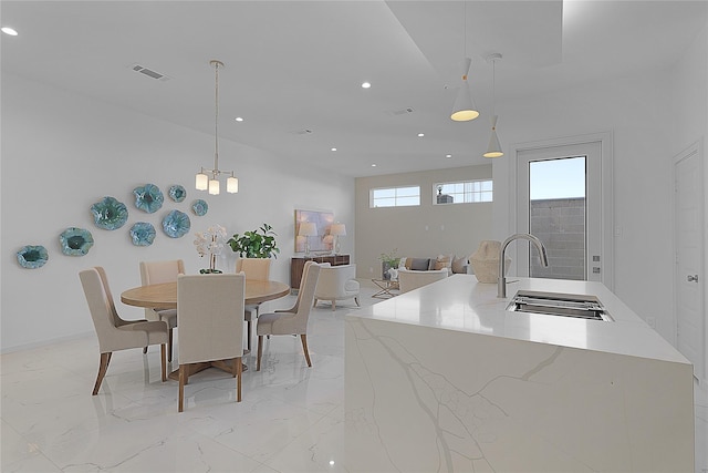 2933 El Fenice Ln, Houston, TX 77057 - dining room with recessed lighting and light marble finish floors