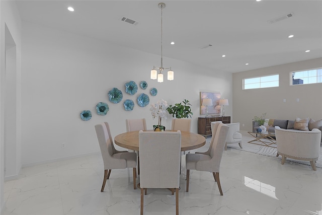 2933 El Fenice Ln, Houston, TX 77057 - dining space with recessed lighting, light marble finish flooring, a chandelier, and baseboards