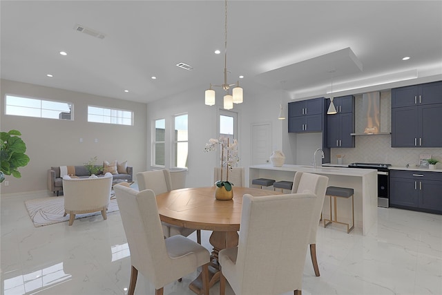 2933 El Fenice Ln, Houston, TX 77057 - dining area with light marble finish floors, recessed lighting, and baseboards
