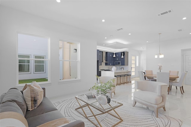 2933 El Fenice Ln, Houston, TX 77057 - living room featuring recessed lighting and baseboards