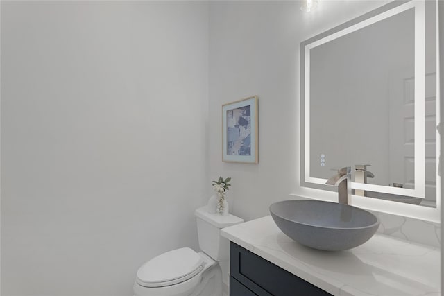 2933 El Fenice Ln, Houston, TX 77057 - bathroom featuring vanity and toilet