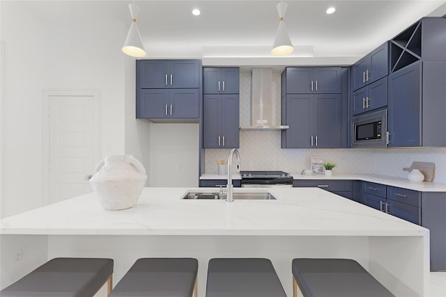 2933 El Fenice Ln, Houston, TX 77057 - kitchen featuring wall chimney exhaust hood, a sink, stainless steel microwave, backsplash, and recessed lighting