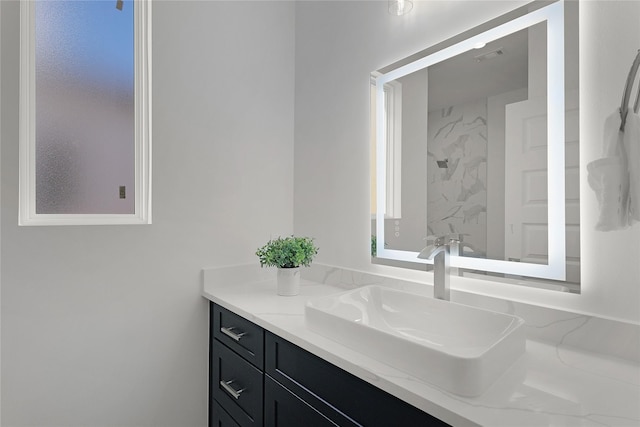 2933 El Fenice Ln, Houston, TX 77057 - bathroom with vanity and a marble finish shower