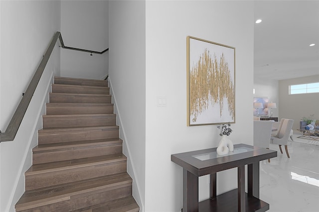 2933 El Fenice Ln, Houston, TX 77057 - staircase featuring recessed lighting and marble finish floors