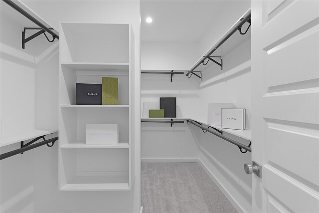 2933 El Fenice Ln, Houston, TX 77057 - spacious closet featuring carpet flooring