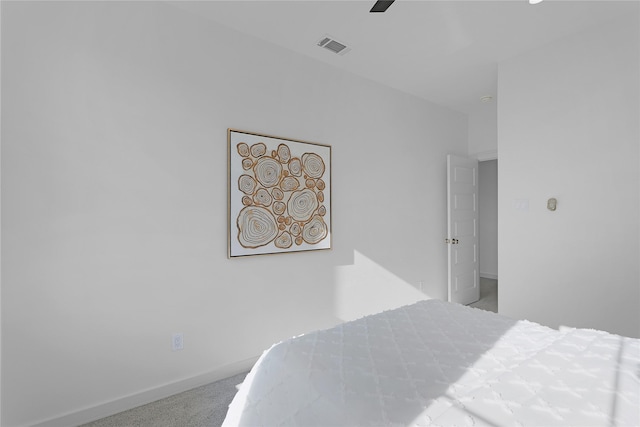 2933 El Fenice Ln, Houston, TX 77057 - carpeted bedroom featuring baseboards and a ceiling fan