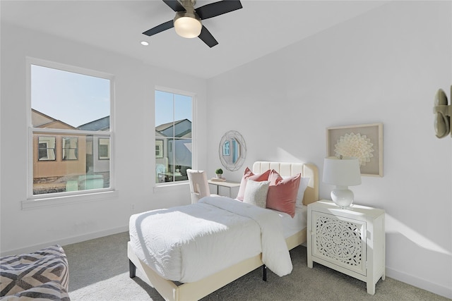 2933 El Fenice Ln, Houston, TX 77057 - carpeted bedroom with baseboards and ceiling fan