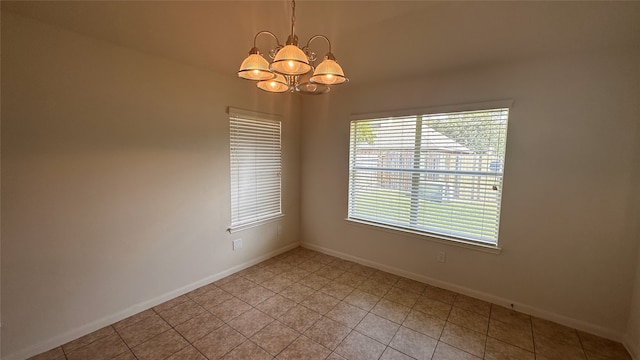 10208 Forest Spring Ln, Pearland, TX 77584 - unfurnished room featuring a chandelier, baseboards, and light tile patterned floors