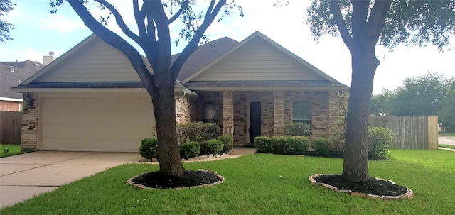 10208 Forest Spring Ln, Pearland, TX 77584 - view of front of house with brick siding, driveway, and a garage