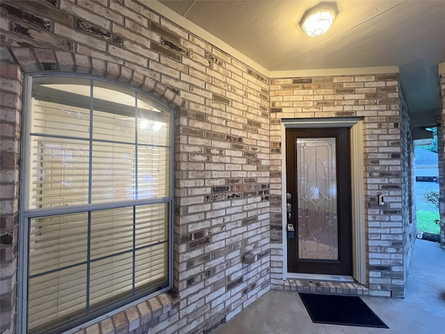 10208 Forest Spring Ln, Pearland, TX 77584 - view of exterior entry featuring brick siding