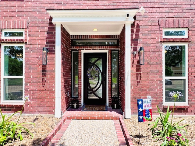 7210 Blenheim Palace Ln, Houston, TX 77095 - view of exterior entry featuring brick siding