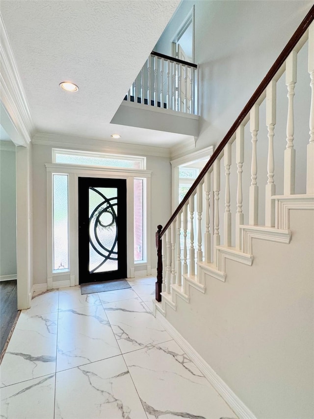 7210 Blenheim Palace Ln, Houston, TX 77095 - foyer featuring baseboards, ornamental molding, stairway, recessed lighting, and marble finish floors