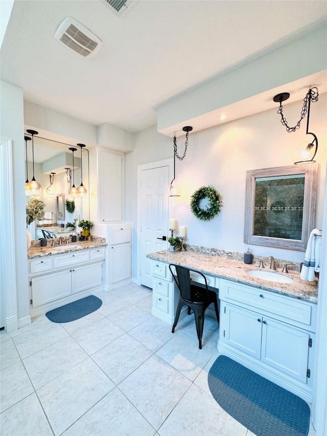 7210 Blenheim Palace Ln, Houston, TX 77095 - full bathroom featuring two vanities and tile patterned flooring