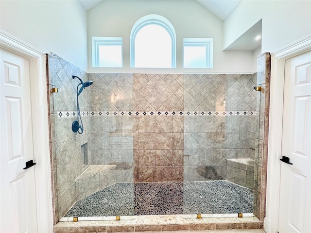 7210 Blenheim Palace Ln, Houston, TX 77095 - bathroom with a tile shower and lofted ceiling