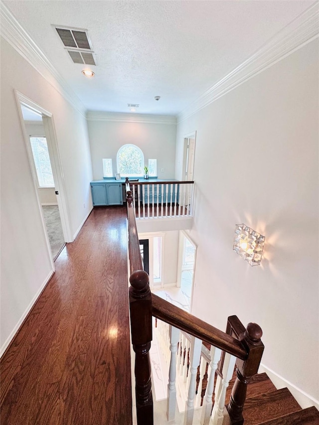 7210 Blenheim Palace Ln, Houston, TX 77095 - staircase featuring wood finished floors, crown molding, and baseboards
