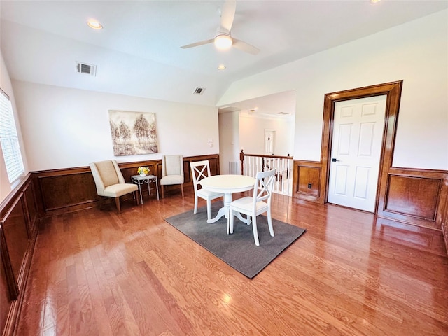7210 Blenheim Palace Ln, Houston, TX 77095 - dining space featuring wood finished floors, a wainscoted wall, ceiling fan, vaulted ceiling, and recessed lighting