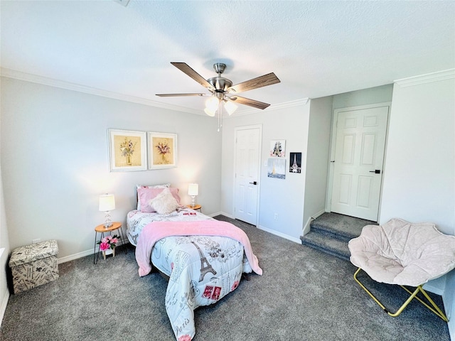 7210 Blenheim Palace Ln, Houston, TX 77095 - bedroom featuring carpet flooring, a ceiling fan, crown molding, baseboards, and a closet