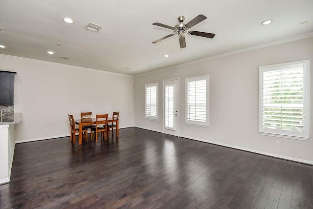 2213 Bellefontaine St, Houston, TX 77030 - dining area featuring plenty of natural light, dark wood-type flooring, ceiling fan, ornamental molding, and recessed lighting