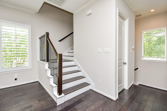 2213 Bellefontaine St, Houston, TX 77030 - stairway featuring crown molding, wood finished floors, plenty of natural light, and recessed lighting