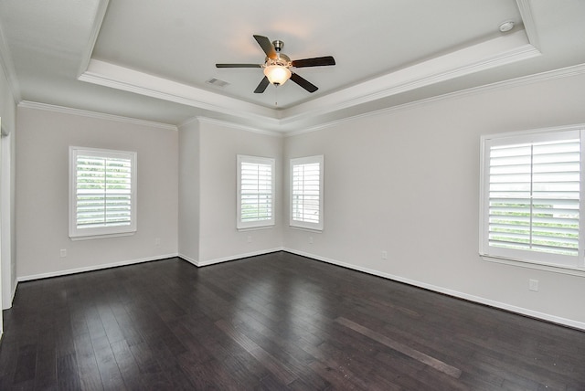 2213 Bellefontaine St, Houston, TX 77030 - spare room with a raised ceiling, a ceiling fan, dark wood-style flooring, crown molding, and a smoke detector