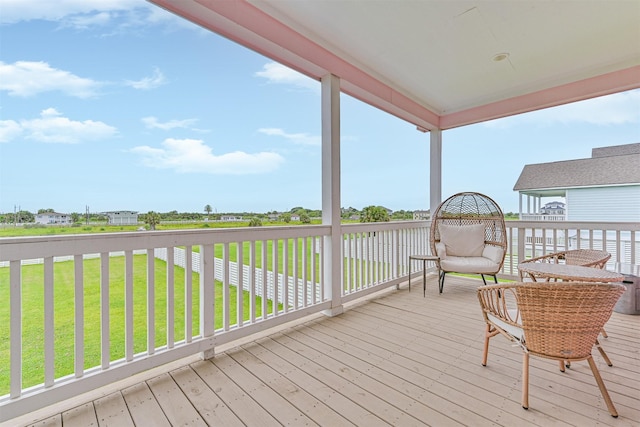 2515 103rd St, Galveston, TX 77554 - wooden deck with a yard