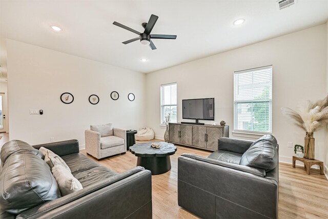 2515 103rd St, Galveston, TX 77554 - living area featuring a ceiling fan, light wood finished floors, recessed lighting, and baseboards