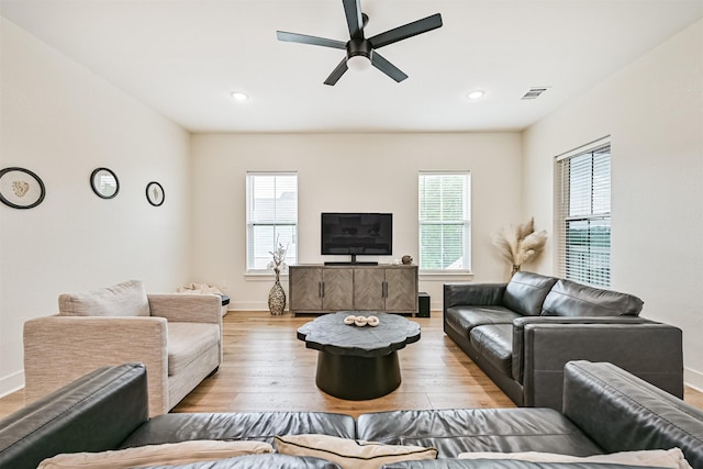 2515 103rd St, Galveston, TX 77554 - living room featuring wood finished floors, baseboards, a ceiling fan, and recessed lighting