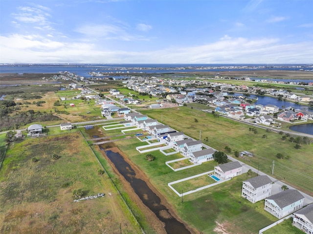 2515 103rd St, Galveston, TX 77554 - aerial view of residential area with a large body of water