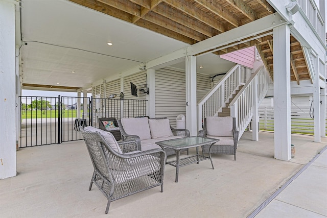 2515 103rd St, Galveston, TX 77554 - view of patio / terrace featuring stairway and outdoor lounge area