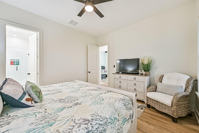 2515 103rd St, Galveston, TX 77554 - bedroom featuring light wood finished floors and a ceiling fan