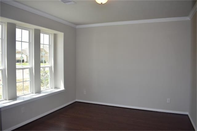 811 River Delta Ln, Rosenberg, TX 77469 - unfurnished room with healthy amount of natural light, dark wood-style floors, and crown molding