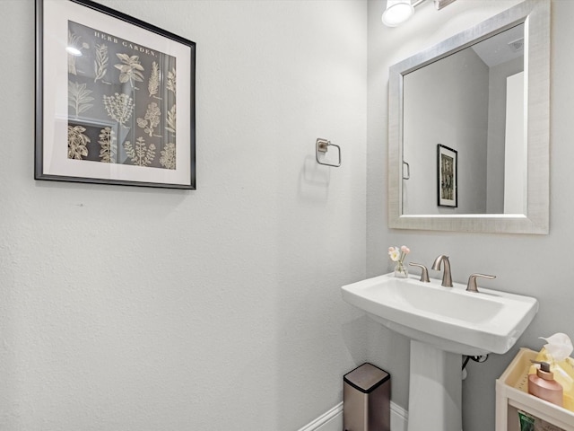 16819 Himley Dr, Cypress, TX 77433 - bathroom with baseboards and a sink