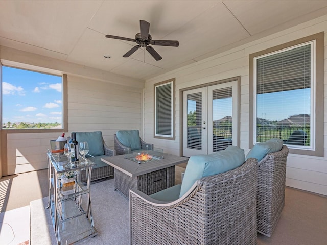 16819 Himley Dr, Cypress, TX 77433 - view of patio / terrace featuring an outdoor living space with a fire pit, french doors, and a ceiling fan