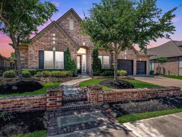 16819 Himley Dr, Cypress, TX 77433 - view of front of house with brick siding, concrete driveway, and an attached garage
