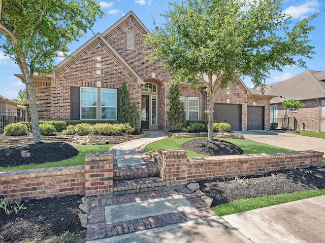 16819 Himley Dr, Cypress, TX 77433 - view of front of property with brick siding, concrete driveway, and an attached garage