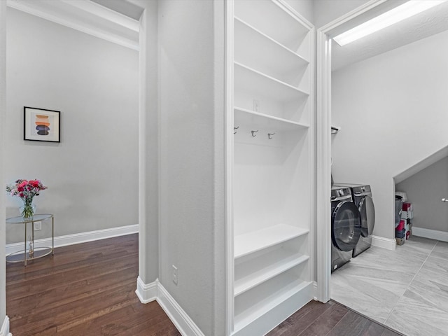 16819 Himley Dr, Cypress, TX 77433 - mudroom with separate washer and dryer, wood finished floors, and baseboards